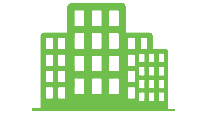 a green icon of an industrial looking building