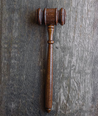 an image of a judges gavel to represent our court research, retrievals and filings