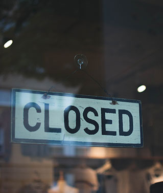 A "Closed" sign representing that we can assist with the dissolution of an entity.