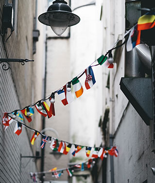 an image of a long string of various country flags representing our translation services